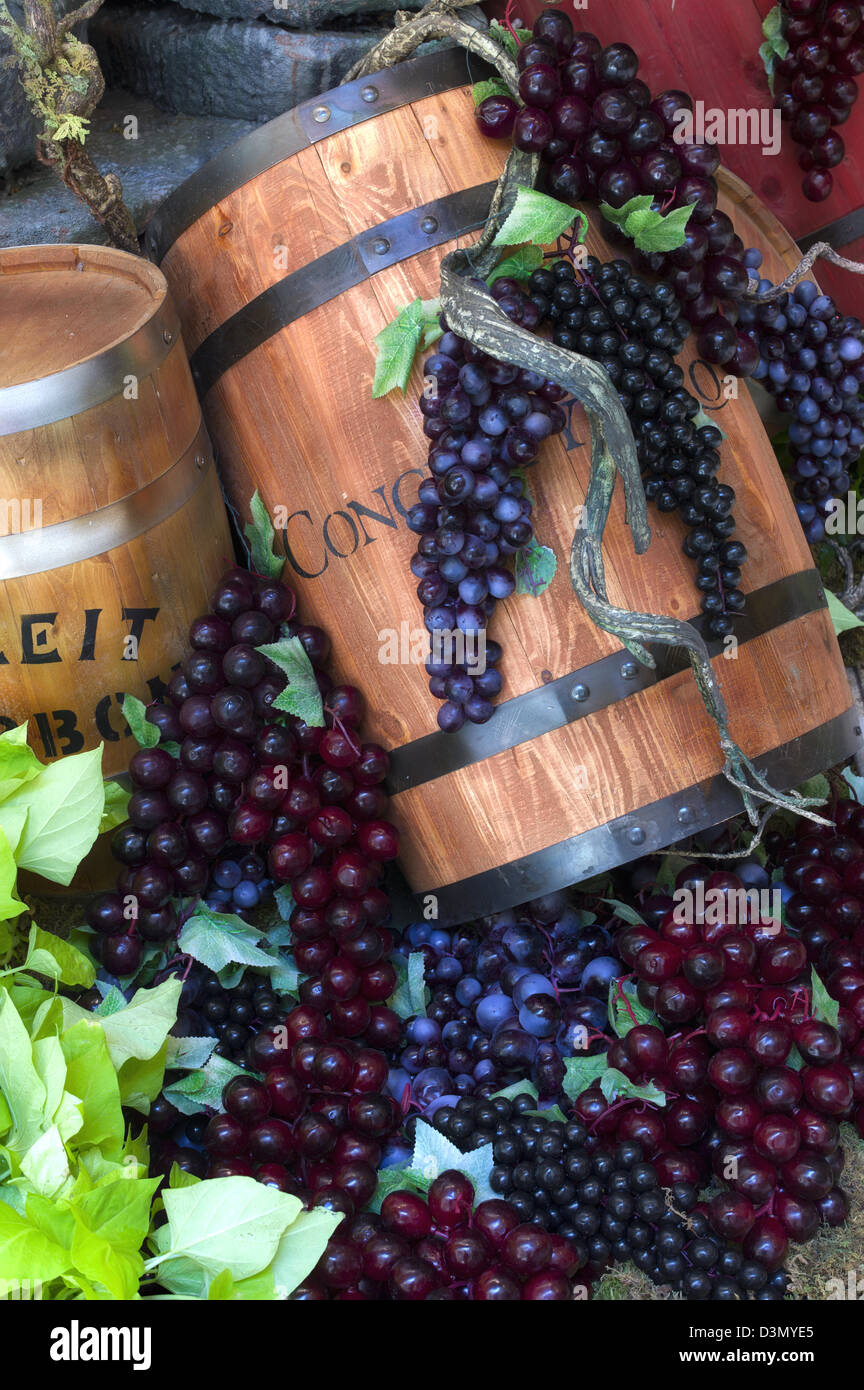 Wine barrel and grape display. Stock Photo
