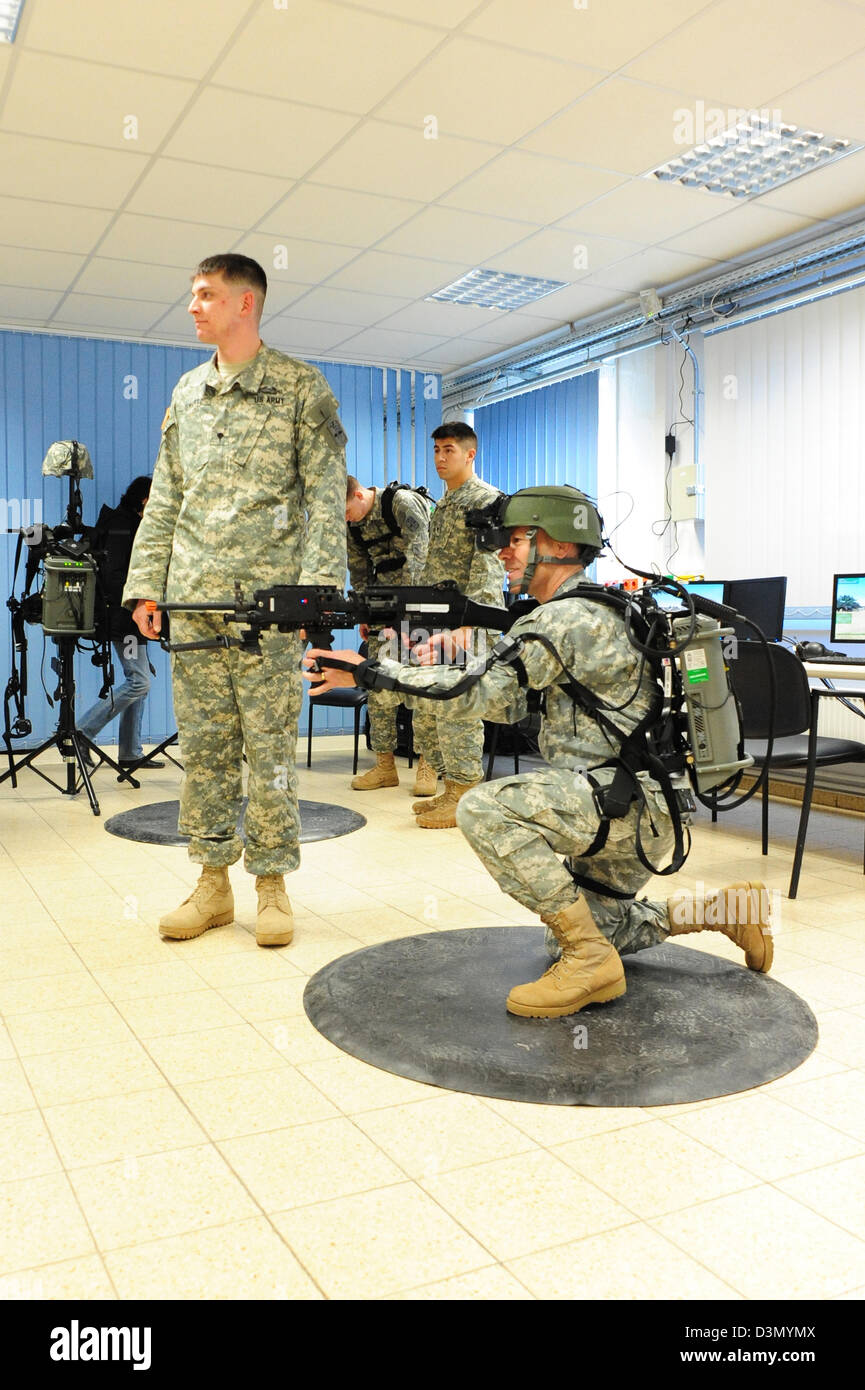 US Army soldiers train using the Dismounted soldier Training System February 21, 2013 at Grafenwoehr, Germany. The DSTS is the first fully-immersive virtual reality training system which simulates a combat environment. Stock Photo