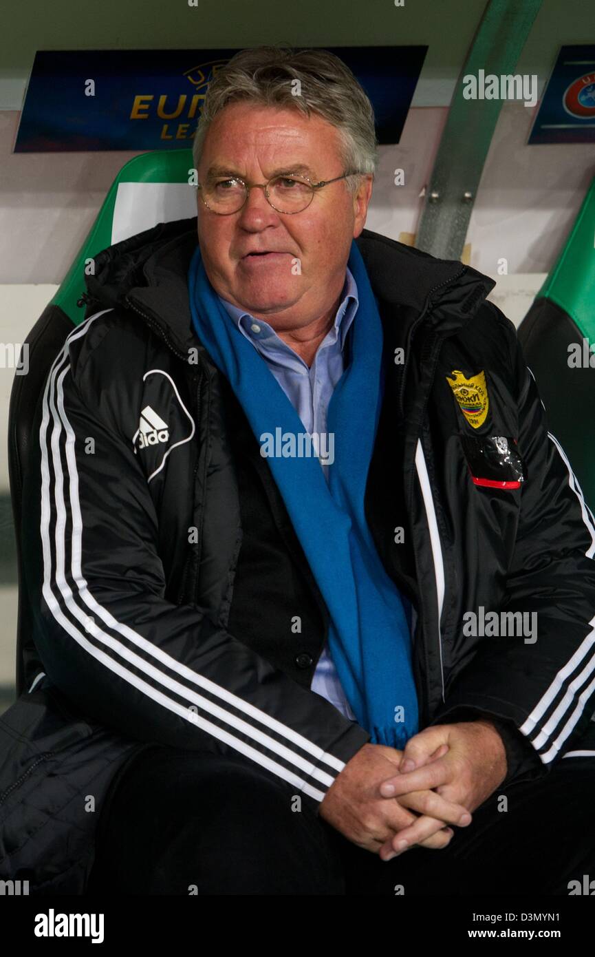 Makhachkala's head coach Guus Hiddink looks on before the UEFA Europa League round of 32 second leg soccer match between Hanover 96 and FC Anzhi Makhachkala at Hannover Arena in Hanover, Germany, 21 February 2013. Photo: Sebastian Kahnert/dpa Stock Photo