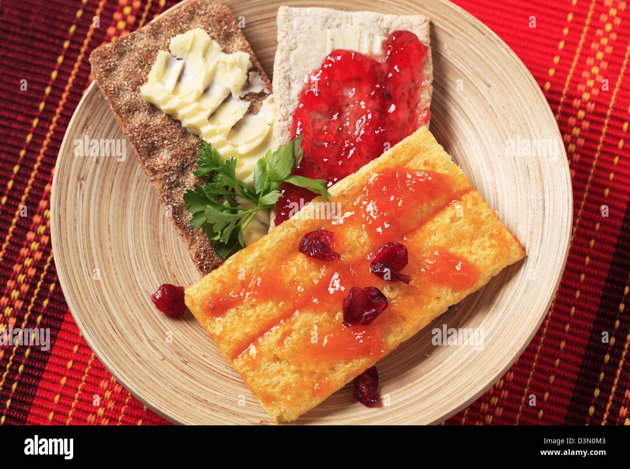 Crispbread with butter and jam Stock Photo