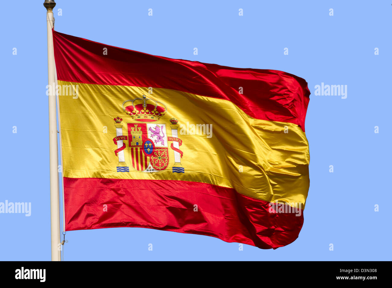 Spain Flag Waving in Blue Sky Stock Photo