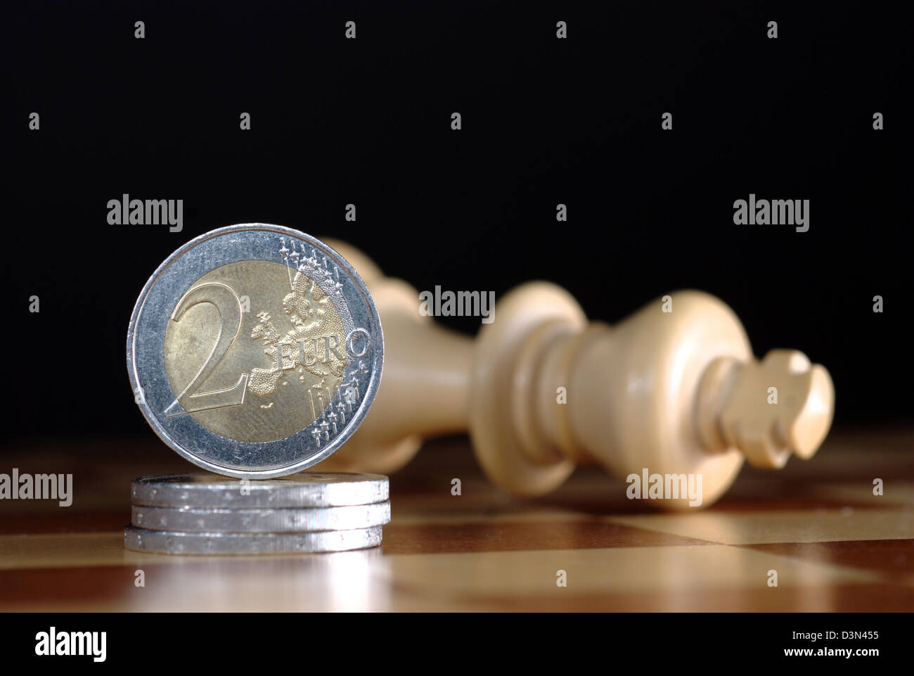 Muenster, Germany, Euro-coins on a chessboard Stock Photo