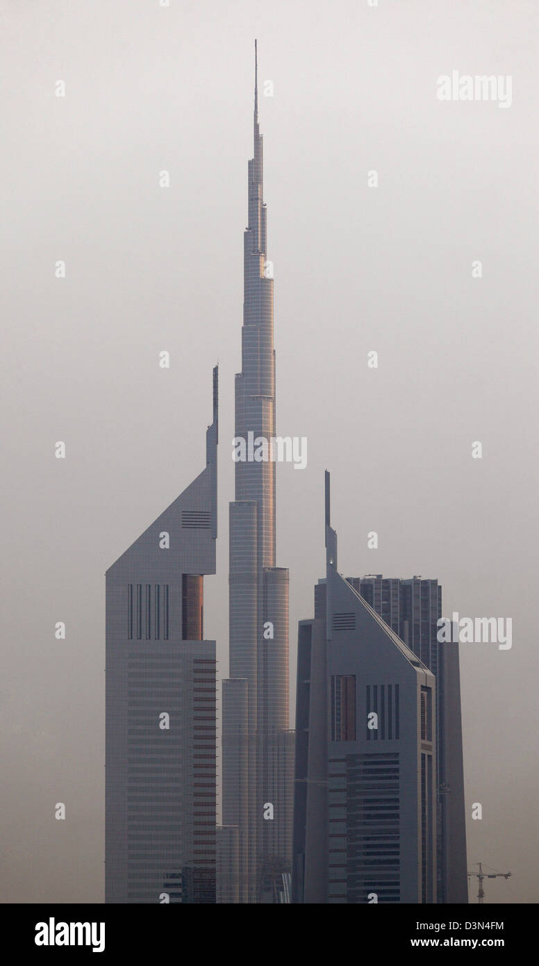 Dubai, United Arab Emirates, Detail of the Burj Khalifa (center) and the Emirates Towers Stock Photo