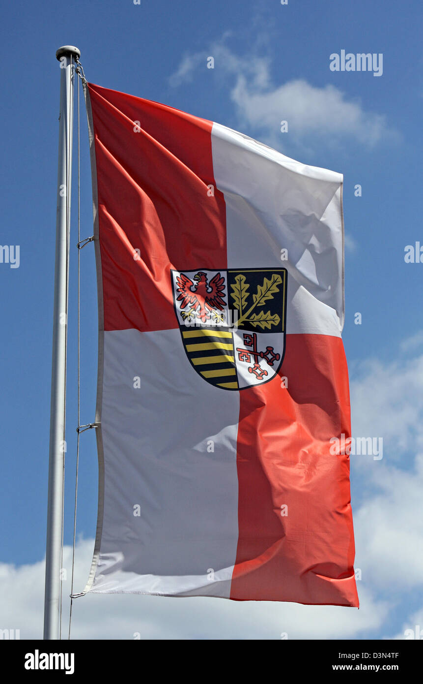 Brueck, Germany, the flag with the emblem of the Potsdam-Mittelmark Stock Photo