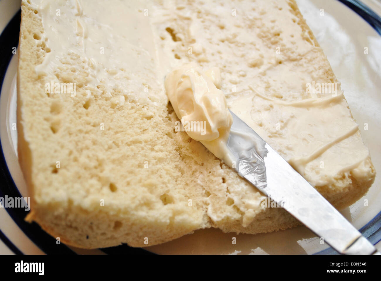 Spreading Mayo on Bread Stock Photo Alamy