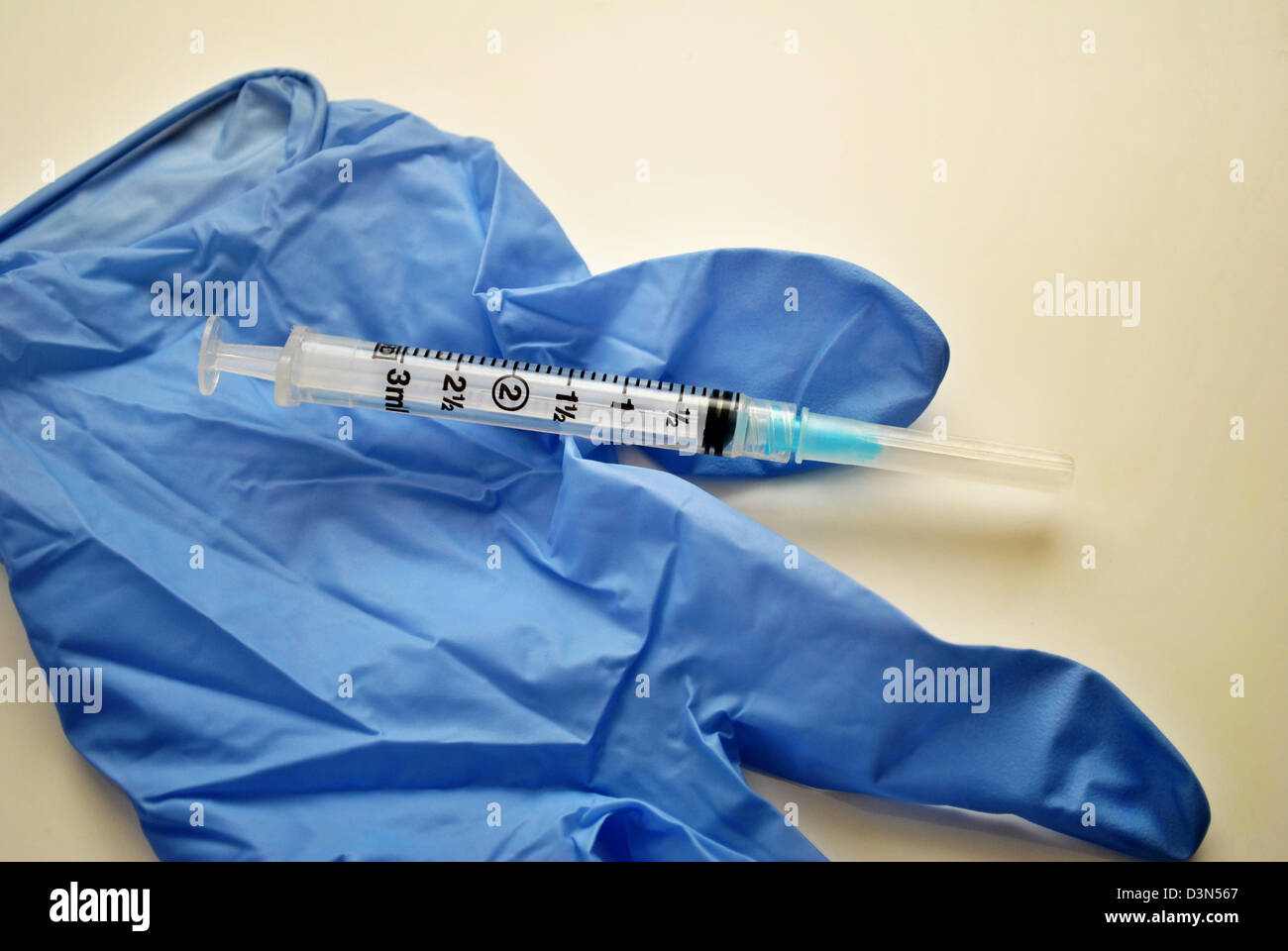 Blue latex glove hi-res stock photography and images - Alamy