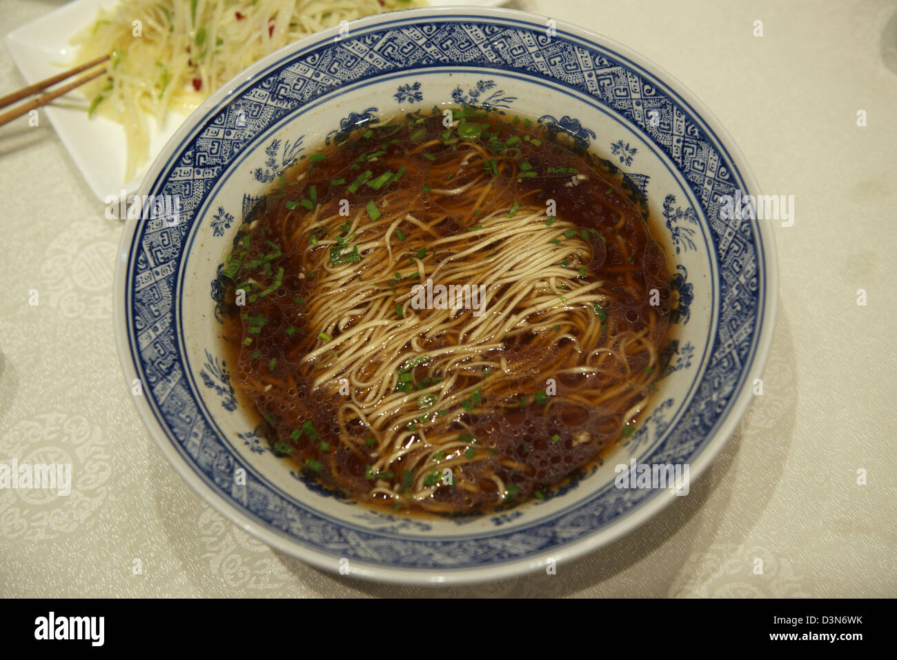 A bowl of Yang Chun Noodle in Yangzhou, Jiangsu province, China. Stock Photo