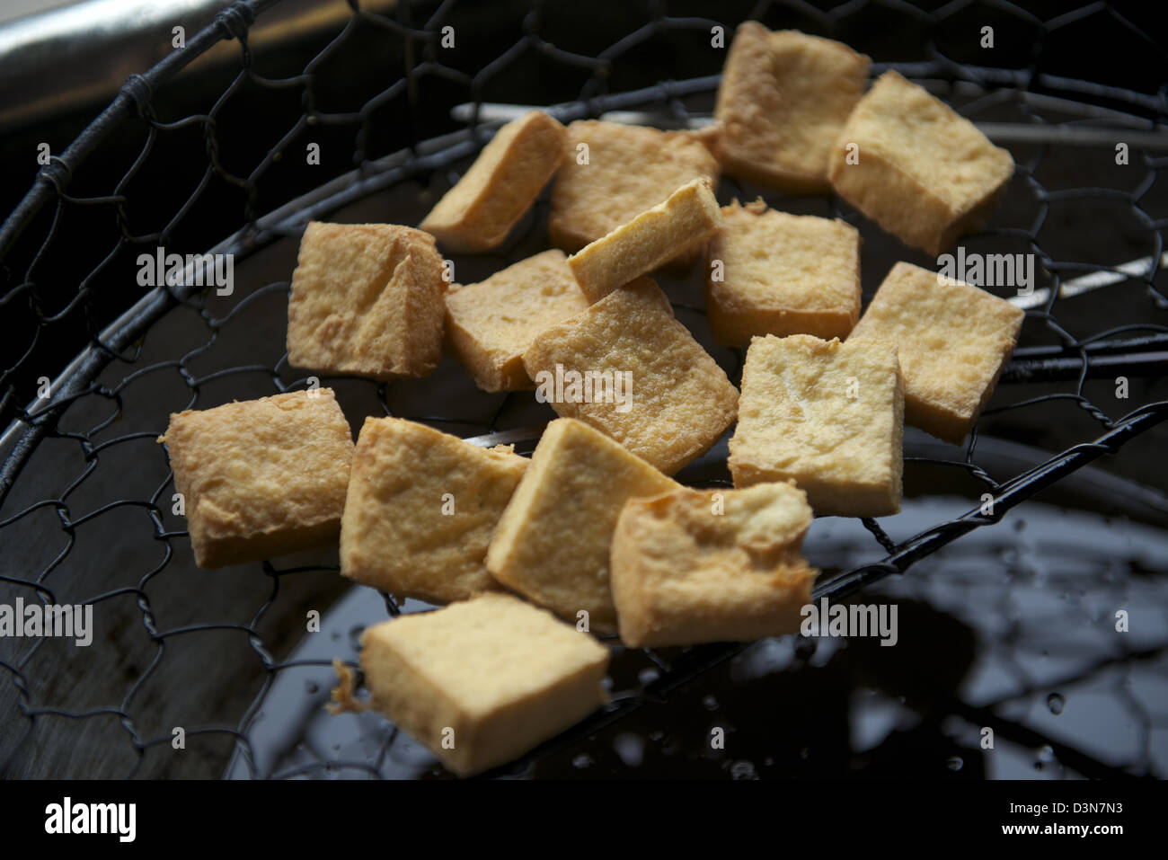 Fried strong-smelling fermented tofu in Yangzhou, Jiangsu province, China. 05-Feb-2013 Stock Photo