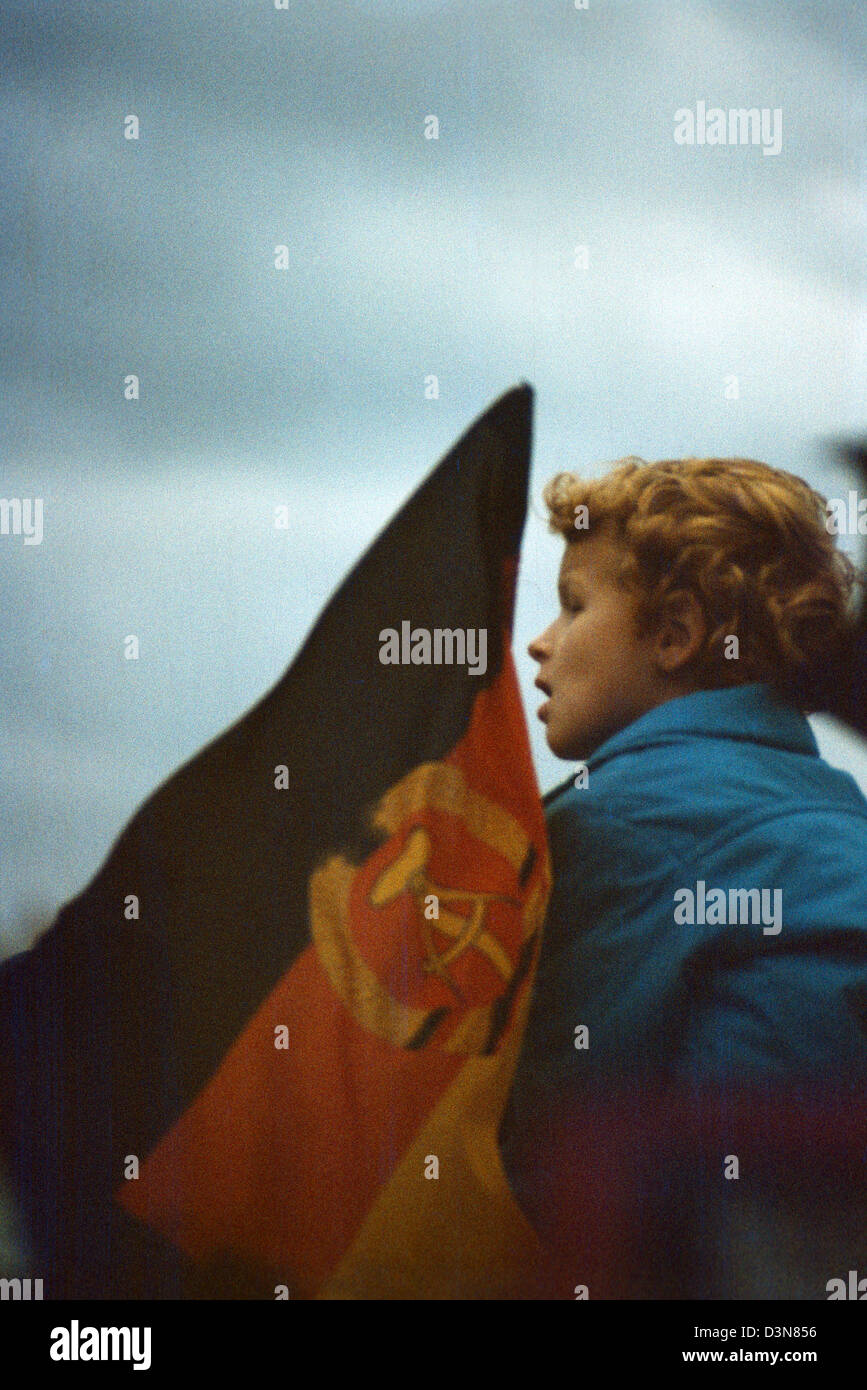Berlin, GDR, child with national flag on the anniversary of the GDR Stock Photo