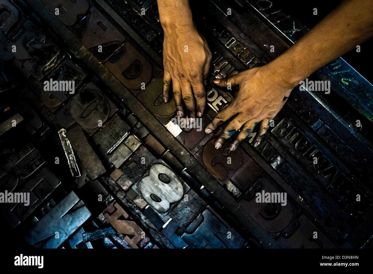 Letterpress types, made of wood, placed in a tray in the vintage print shop in Cali, Colombia. Stock Photo
