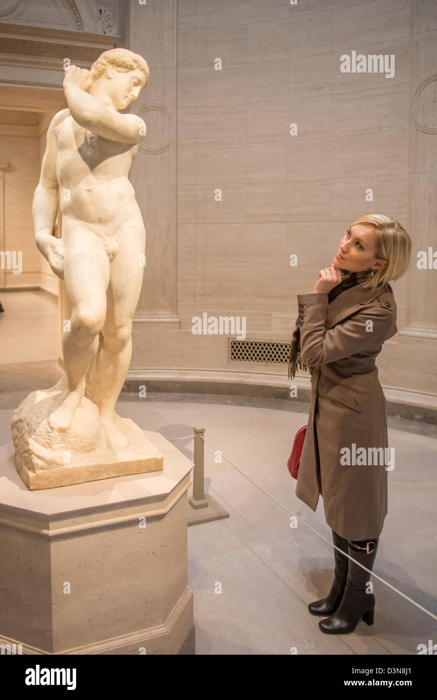 Woman looking at the David-Apollo by Michelangelo at the National Gallery of Art  Washington DC Stock Photo