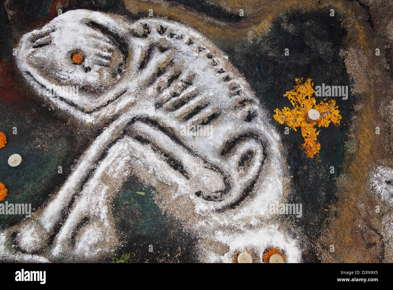 Sand painting of skeleton symbolizing loneliness created for Day of the Dead festival, Oaxaca, Mexico. Stock Photo