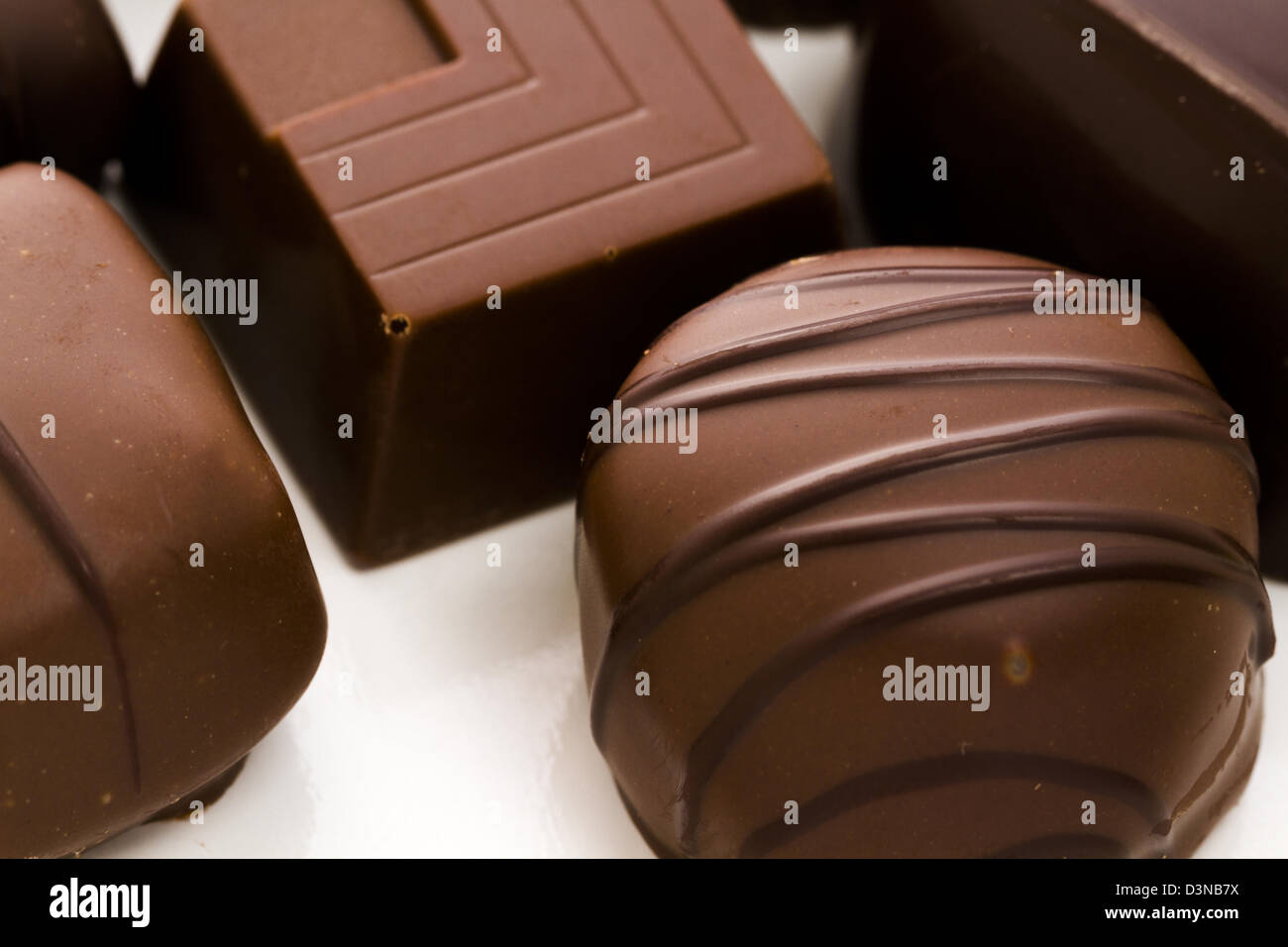 Assorted gourmet chocolate in a box Stock Photo Alamy
