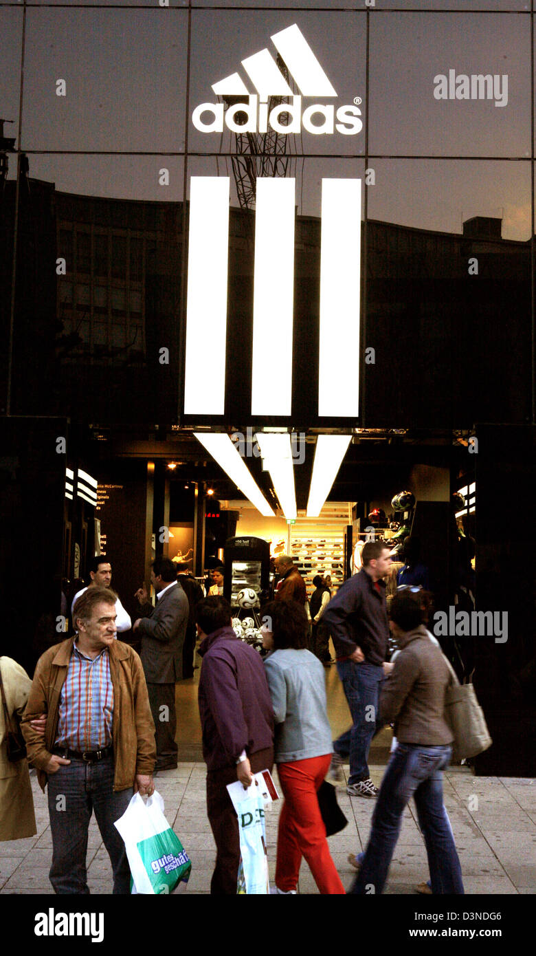 The picture shows consumers at the entrance to the Adidas store on Europe's  most profit-yielding