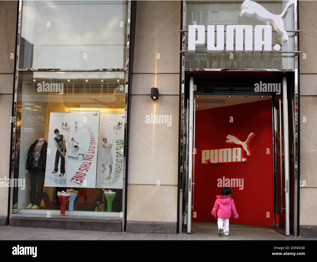 The picture shows consumers at the entrance to the Puma store on Europe's  most profit-yielding