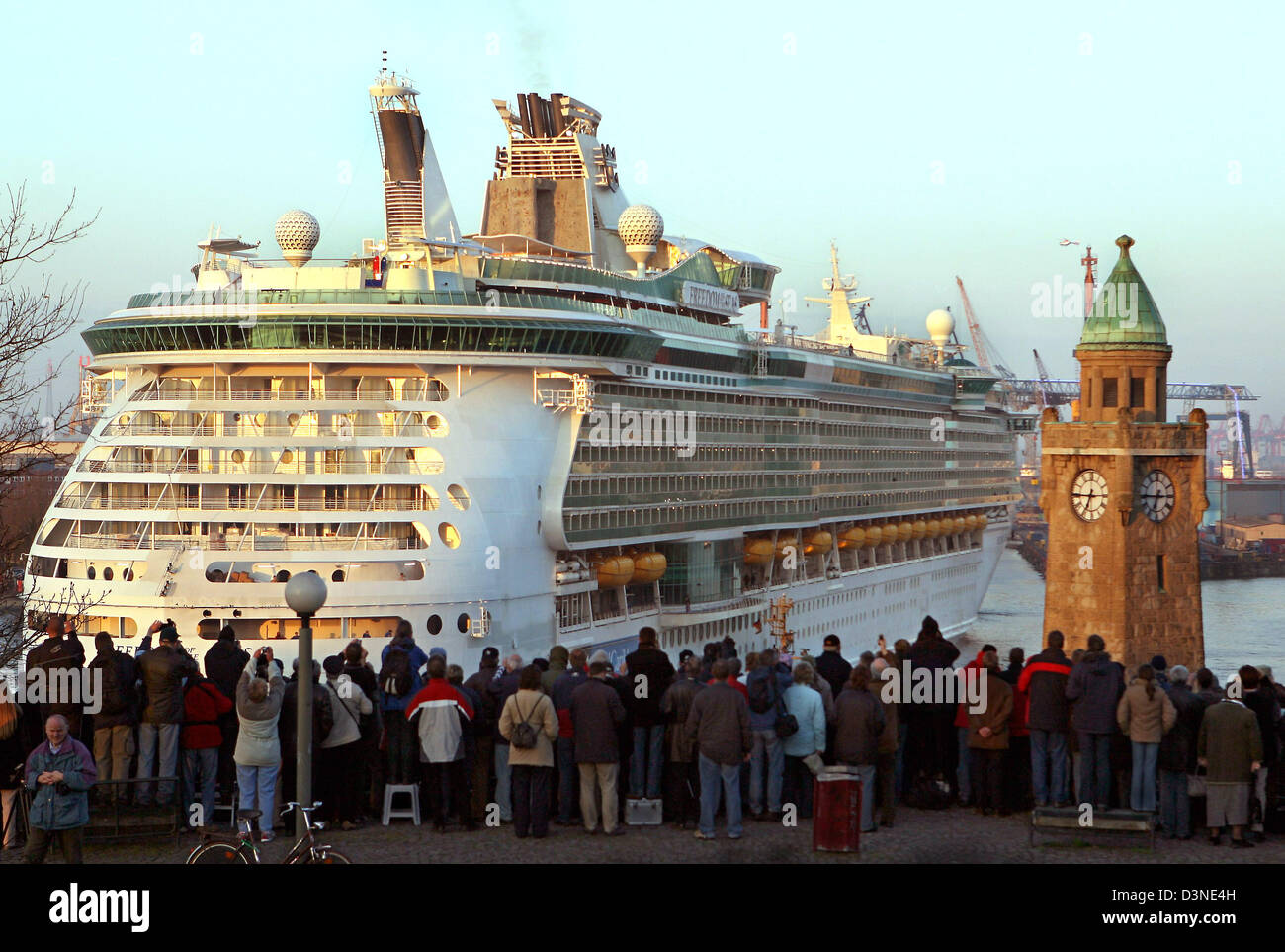 The giant cruiser 'Freedom of the Seas' is watched by many onlookers on