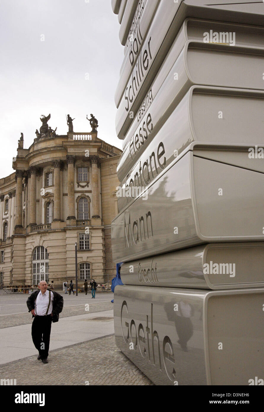 The picture shows a book sculpture of twelve metres height at the Bebelplatz in Berlin, Germany, Friday 21 April 2006. The sculpture titled 'The modern printing' is part of the image campaign 'Country of Ideas' ('Land der Ideen') for the soccer world cup in Germany. The location of the sculpture commemorates the book burning by the Nazis on 10 May 1933. Photo: Bernd Settnik Stock Photo