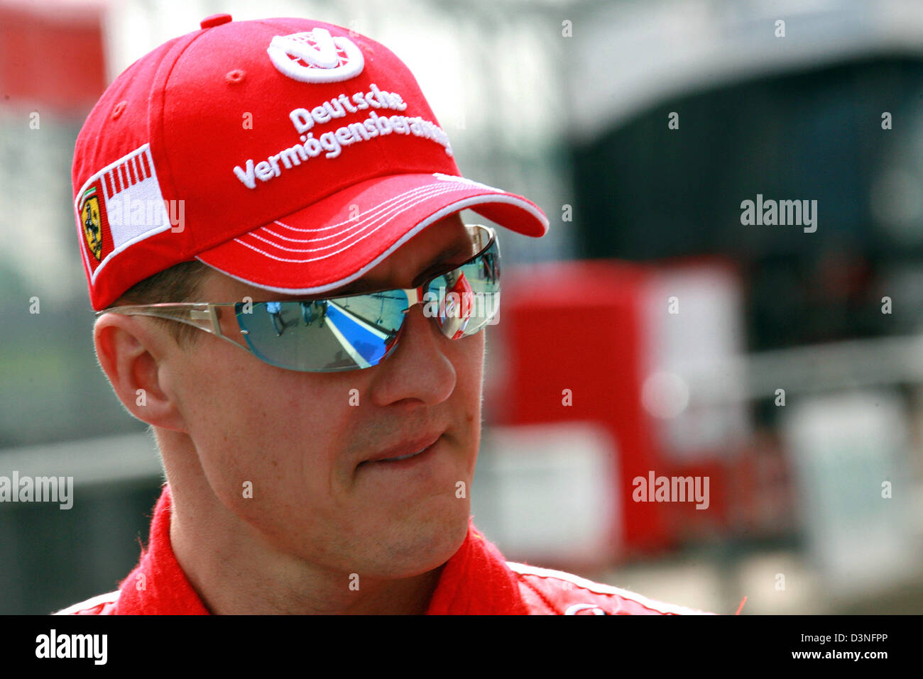 German Formula One pilot Michael Schumacher of Scuderia Ferrari seen with  reflections on his sunglasses at the Nuerburgring race track in Nuerburg,  Germany, Thursday, 4 May 2006. The Grand Prix of Europe