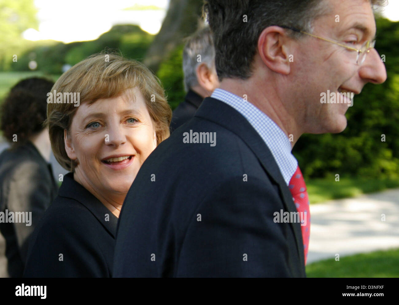 German Chancellor Angela Merkel arrives through the western gate to