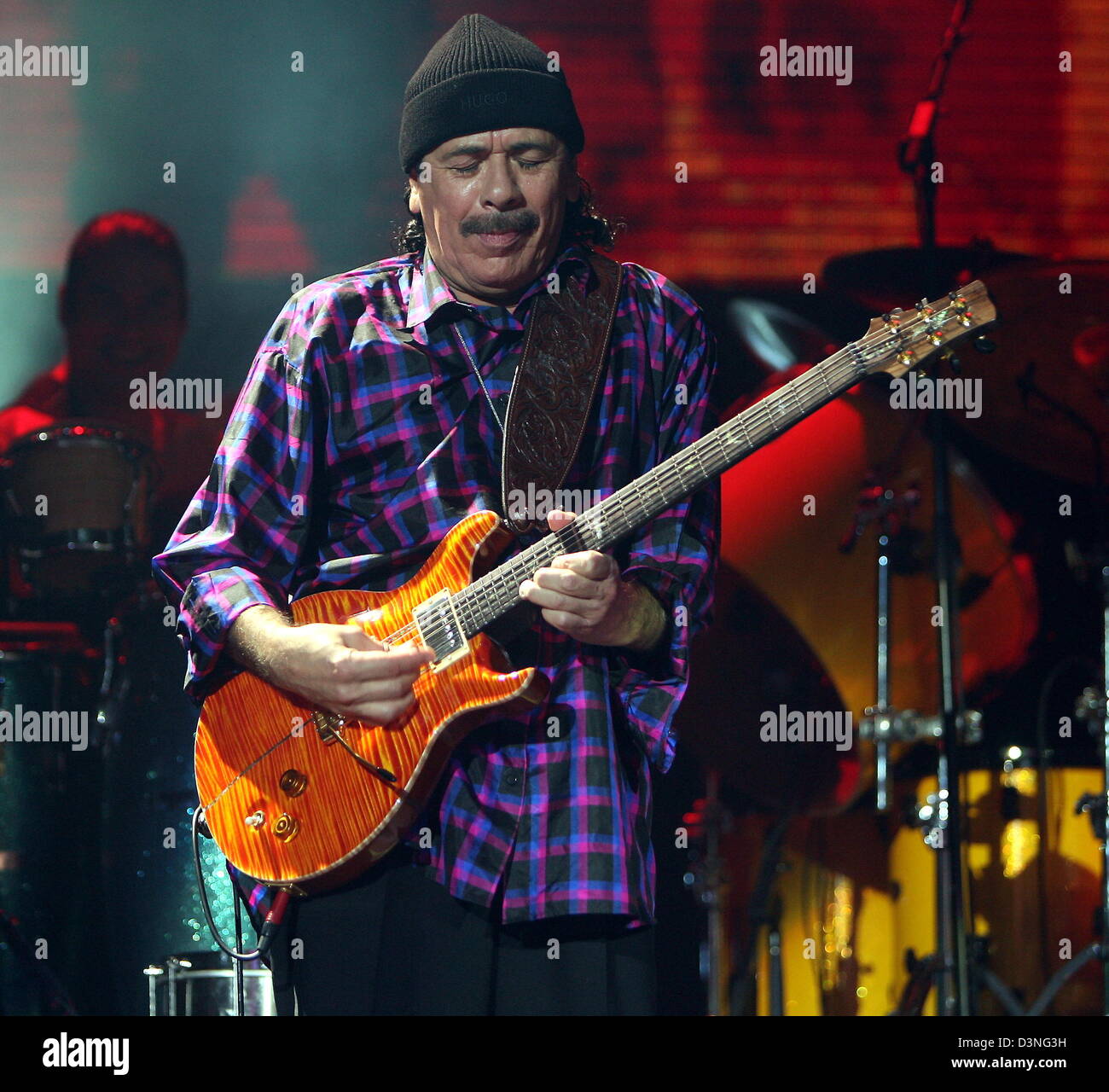 Mexican superstar guitarist Carlos Santana plays his guitar in the Color  Line Arena in Hamburg, Germany, 5 May 2006. Santana (58) started his  European tour with 9,000 fans. The 'All That I