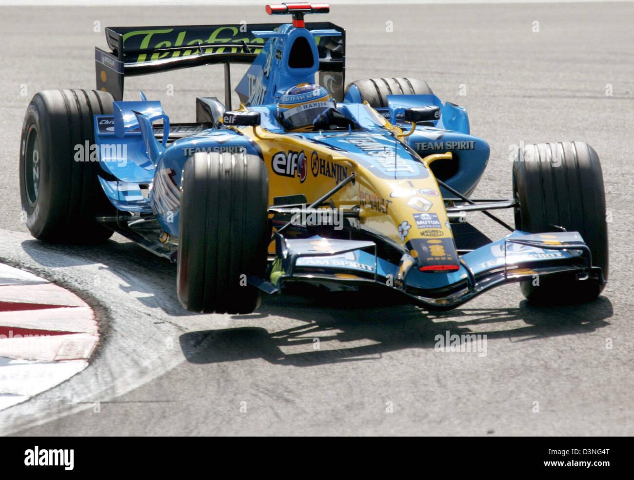 Spanish Formula One pilot Fernando Alonso of Renault F1 team enters the  corner during the third practice session at the 2006 FORMULA 1 Grand Prix  of Europe at the Nuerburgring circuit, Germany,