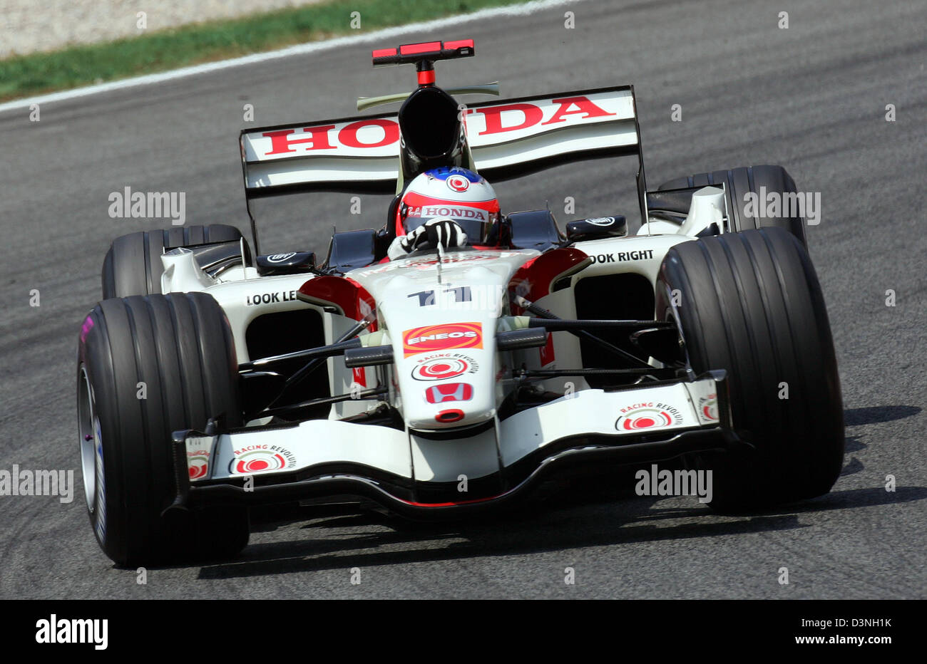 Brazilian Formula One pilot Rubens Barrichello of Honda Racing F1 team  steers through the corner during the second training session to the 2006 FORMULA  1 Grand Prix of Spain at the race