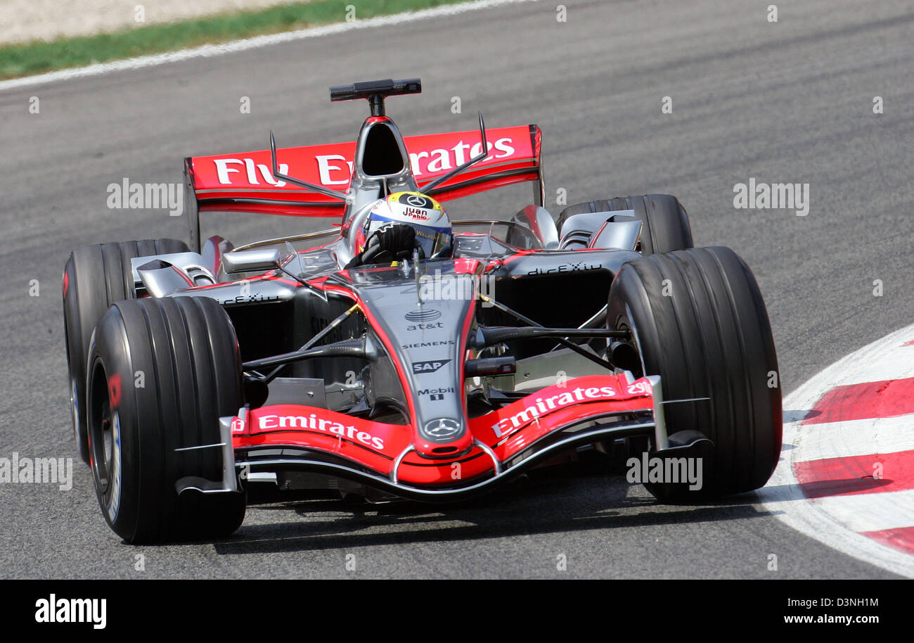 Columbian Formula One pilot Juan Pablo Montoya of McLaren Mercedes F1 team  accelerates out the corner during the second practice session to the 2006  FORMULA 1 Grand Prix of Spain at the