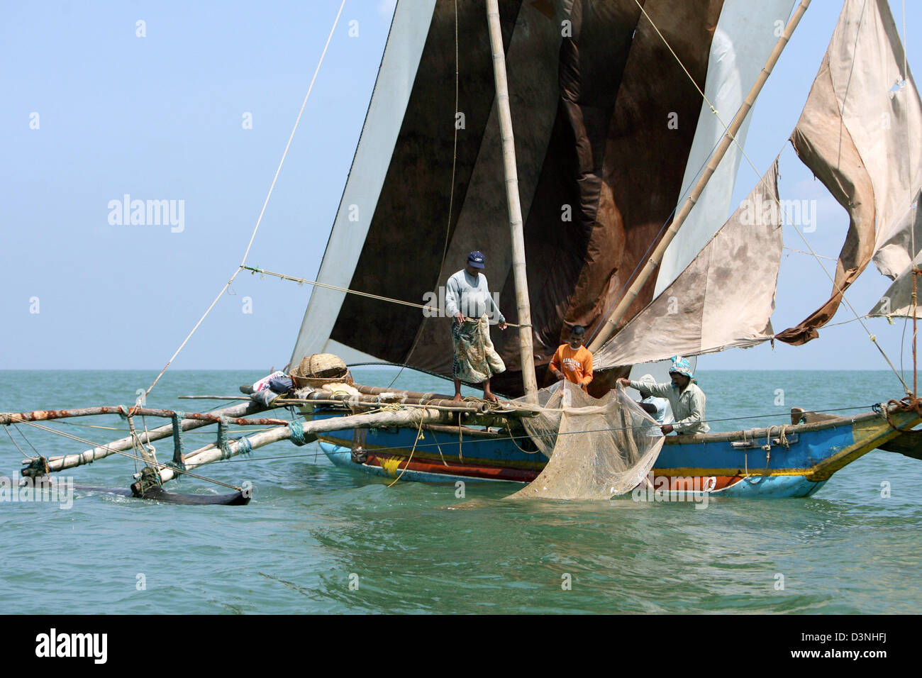Fishermen trawl shrimp offshore Negombo, Sri Lanka, 05 May 2006. Most ...