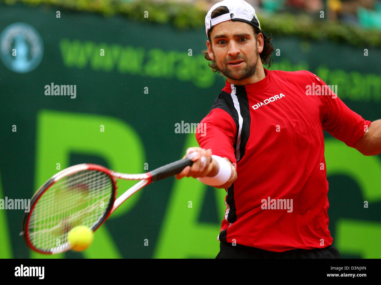 German tennis pro returns a ball during his match against Czech Berdych at the World Team Cup in Duesseldorf, Germany, Thursday, 25 May 2006.Photo: Felix Heyder Stock Photo