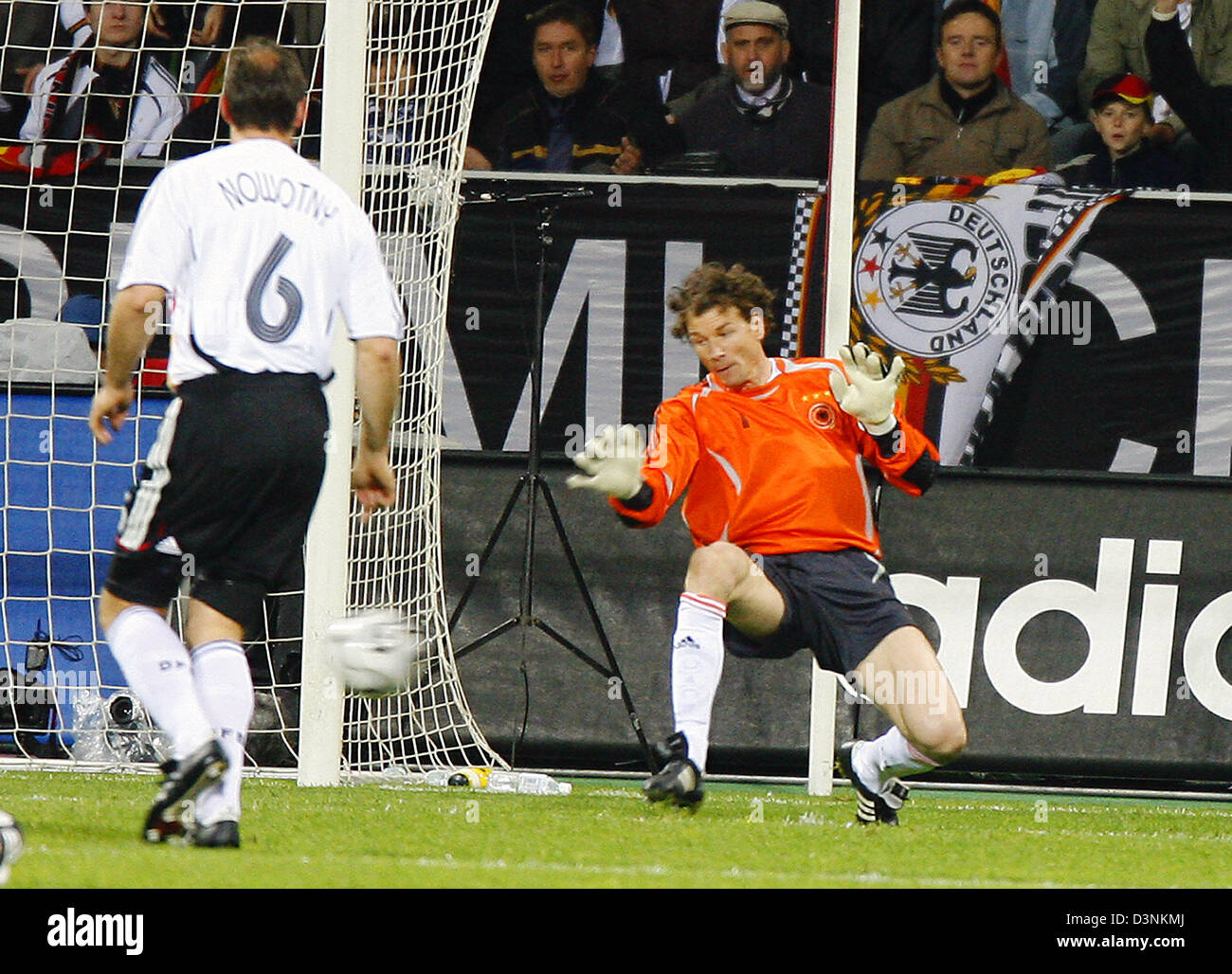 German national soccer team defender Jens Nowotny (L) watches his goalkeeper Jens Lehmann