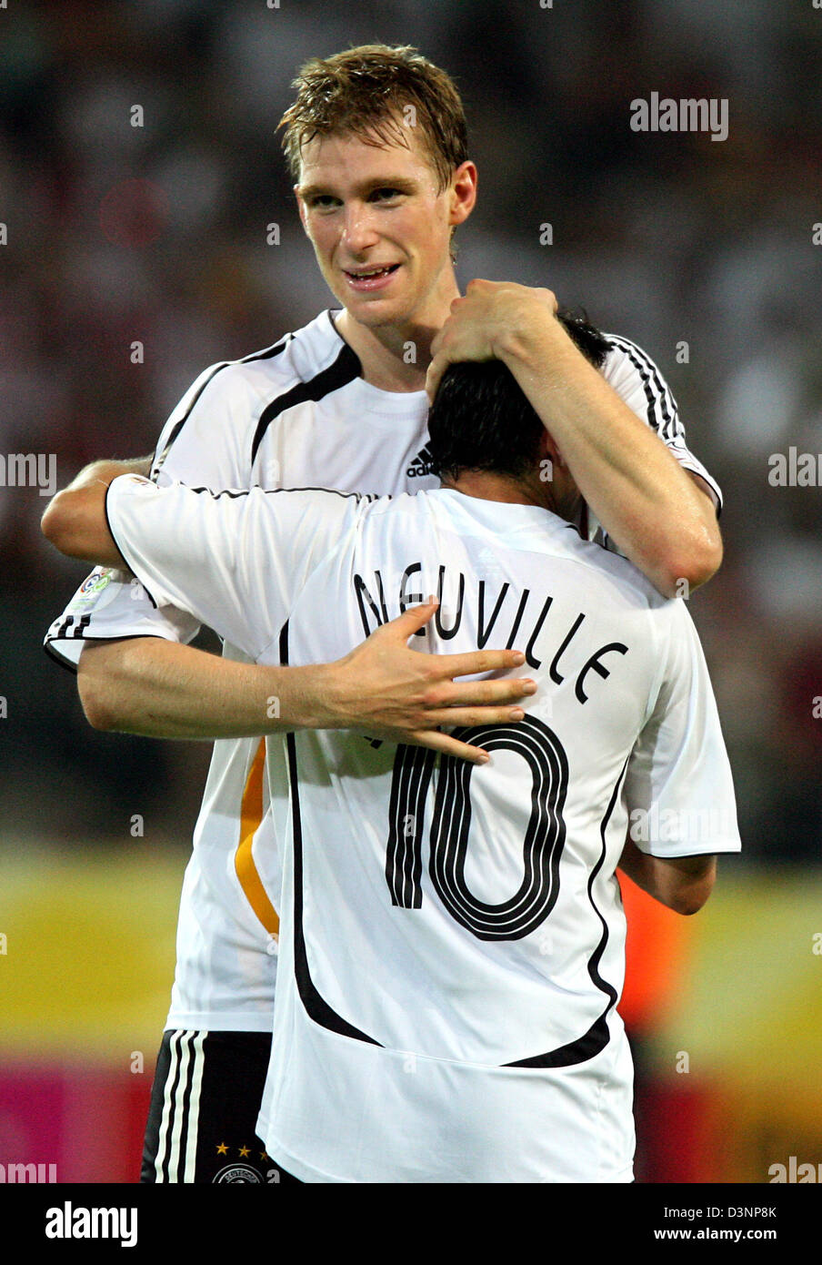 German national soccer player Oliver Neuville celebrates his 10 goal
