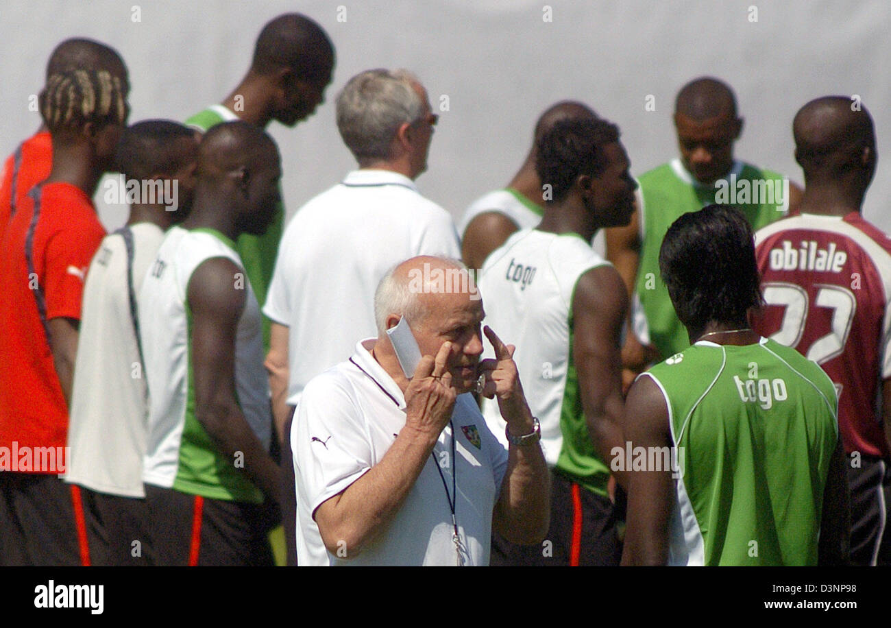 German Otto Pfister (C) gestures during a training session with the Togolese national soccer team in Wangen, Germany, Thursday, 15 June 2006. The ongoing coaching saga that has thrown Togo's FIFA World Cup 2006 campaign into disarray seems to be solved after Pfister agreed to return to the coaching position. Pfister last Saturday left the West African country's World Cup base and r Stock Photo