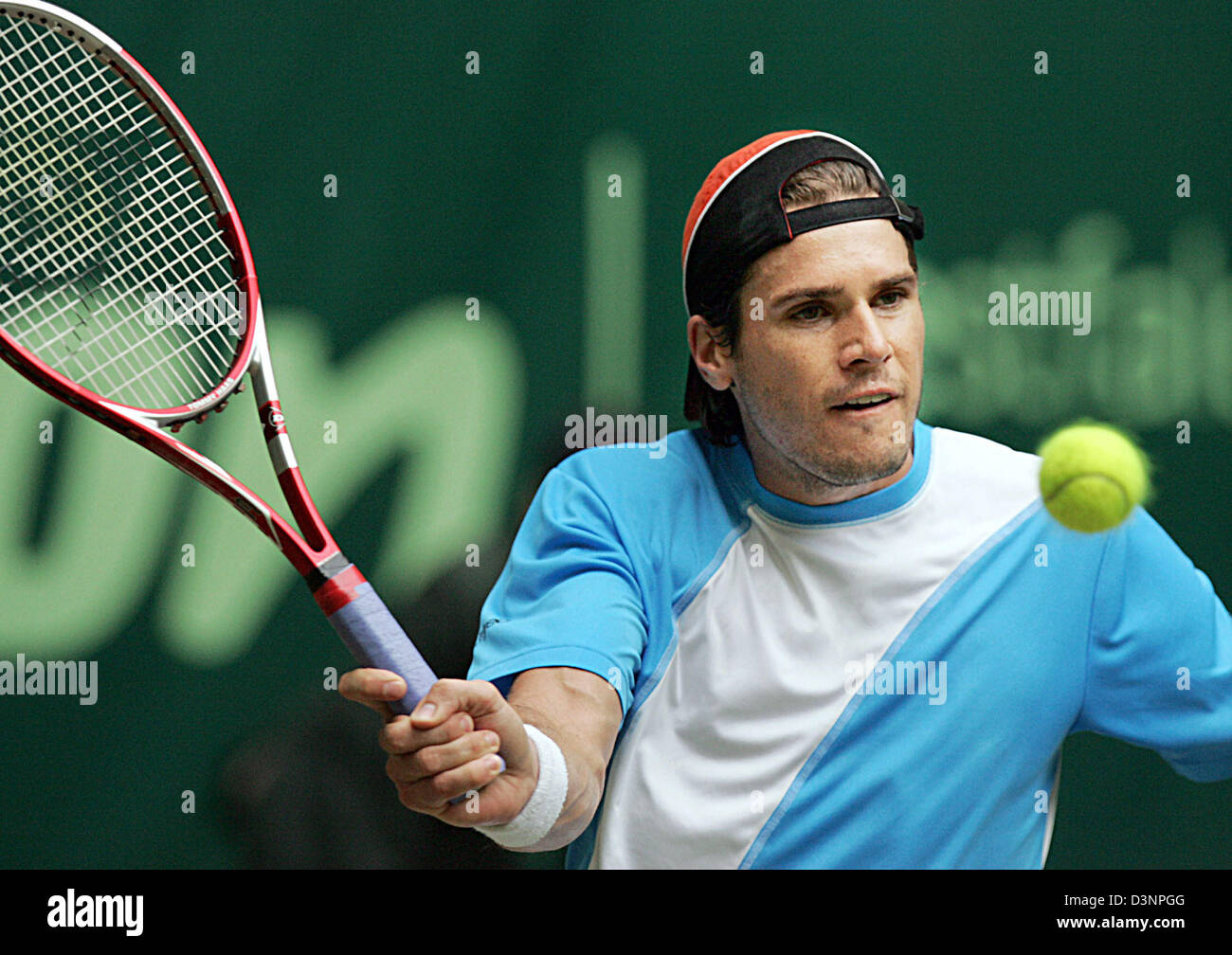 The world's number one tennis player Roger Federer returns the ball back  from Germany's Tommy Haas during the semi finals of the Men's Dubai Tennis  Championships on March 2, 2007. Federer won