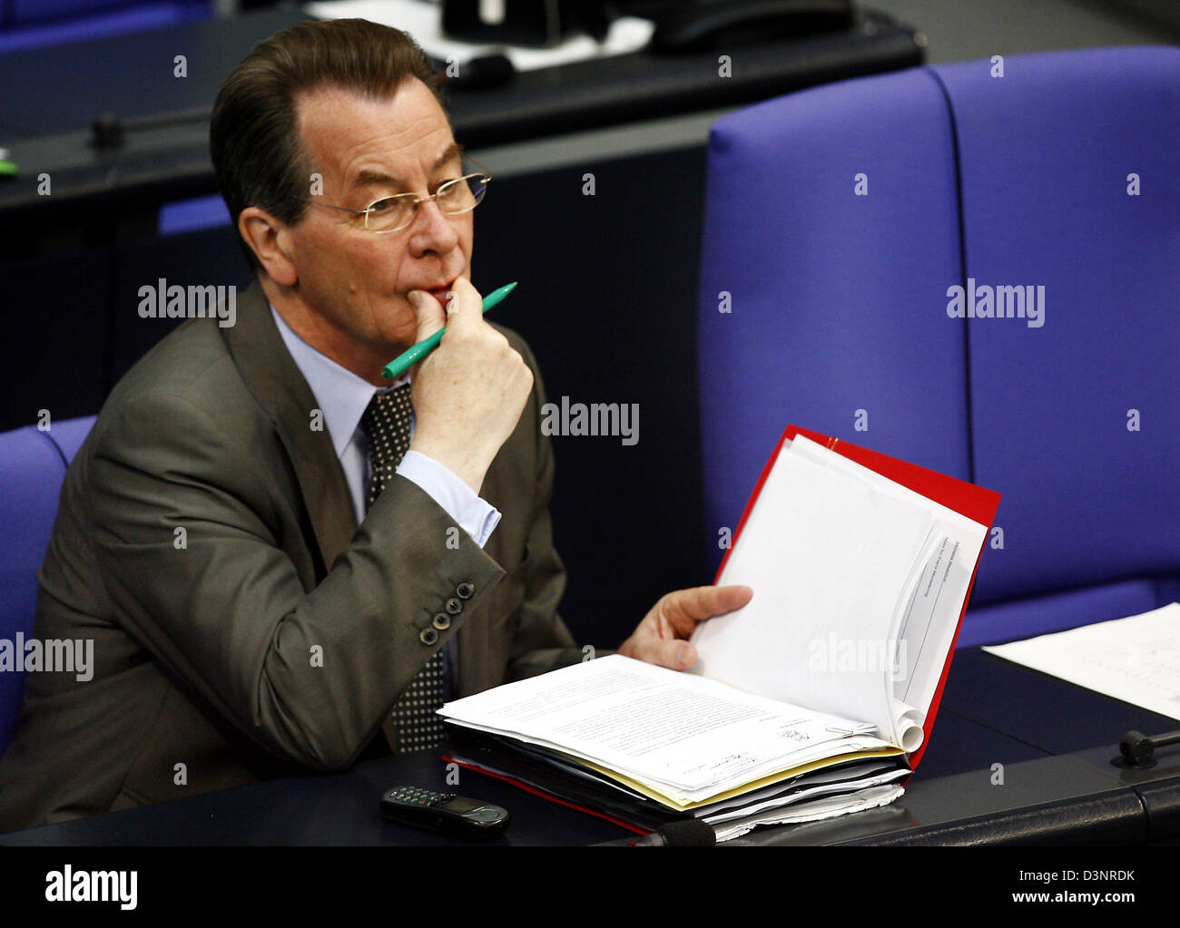 German Federal Minister for Labour and Social Affairs Franz Muentefering of the Social Democrats (SPD) is absorbed in thoughts during the budget debate in the Bundestag in Berlin, Germany, Friday 23 June 2006. The parliament decides on the great coalition's first budget today. Photo: Steffen Kugler Stock Photo