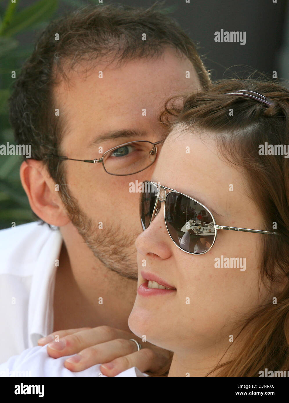 The picture shows Canadian Formula One pilot Jacques Villeneuve for BMW Sauber and his wife Johanna at the paddock of the Gilles Villeneuve race track in Montreal, Canada, Sunday, 25 June 2006. Photo: Jens Buettner Stock Photo