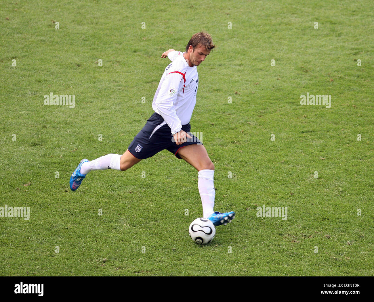 England's national soccer star David Beckham kicks the ball during the FIFA World Cup 2006 second round tie with Ecuador in Stuttgart, Germany, Sunday, 25 June 2006. England advanced to the quarter finals with a 1-0 triumph. Photo: Uli Deck dpa +++ Mobile Services OUT +++ Please refer to FIFA's terms and conditions Stock Photo