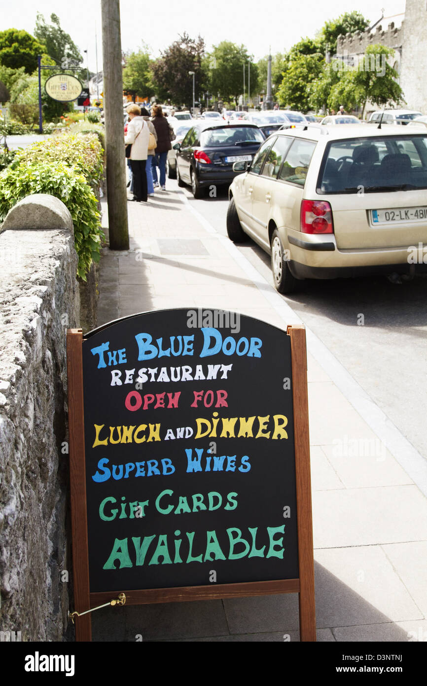 Signboard of a restaurant, The Blue Door Restaurant, Adare, County Limerick, Republic of Ireland Stock Photo