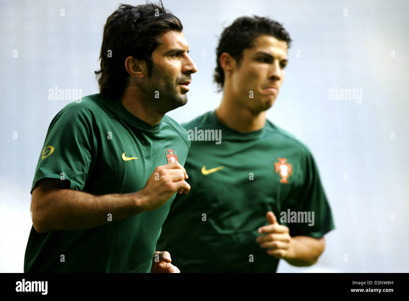 Portugal's Luis Figo (L) and Cristiano Ronaldo shown during a training session at the FIFA World Cup Stadium in Munich, Germany, Tuesday, 4 July 2006. Portugal will play against France in the semi final of the FIFA World Cup on Wednesday in Munich. Photo: MATTHIAS SCHRADER +++ Mobile Services OUT +++ Please refer to FIFA's Terms and Conditions. Stock Photo