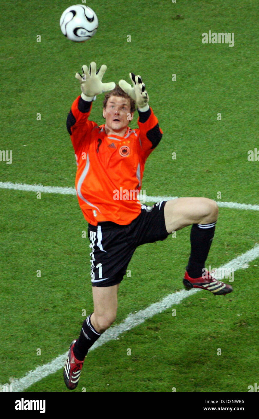 German goal keeper Jens Lehmann jumps for the ball during the semi-final of the 2006 FIFA World Cup between Germany and Italy in Dortmund, Germany, Tuesday, 04 July 2006. DPA/ROLF VENNENBERND +++ Mobile Services OUT +++ Please refer to FIFA's terms and conditions Stock Photo