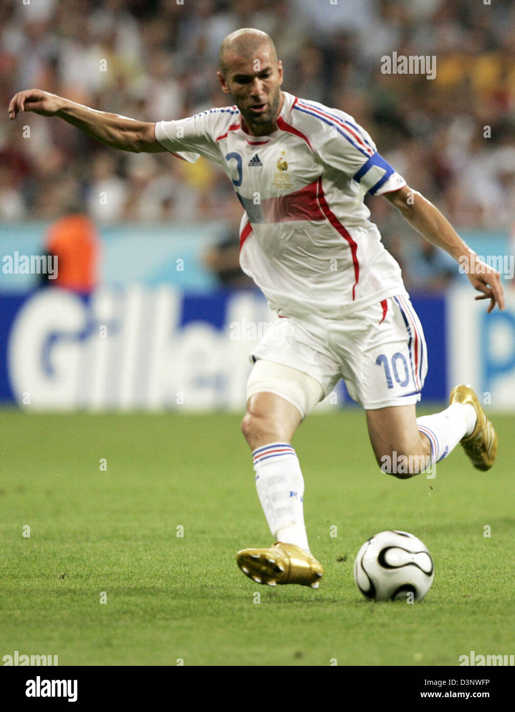 French Zinedine Zidane kicks the ball during the semi final match of the 2006 FIFA World Cup Portugal vs. France in Munich, Germany, Wednesday 05 July 2006. DPA/MATTHIAS SCHRADER +++ Mobile Services OUT +++ Please refer to FIFA's terms and conditions Stock Photo