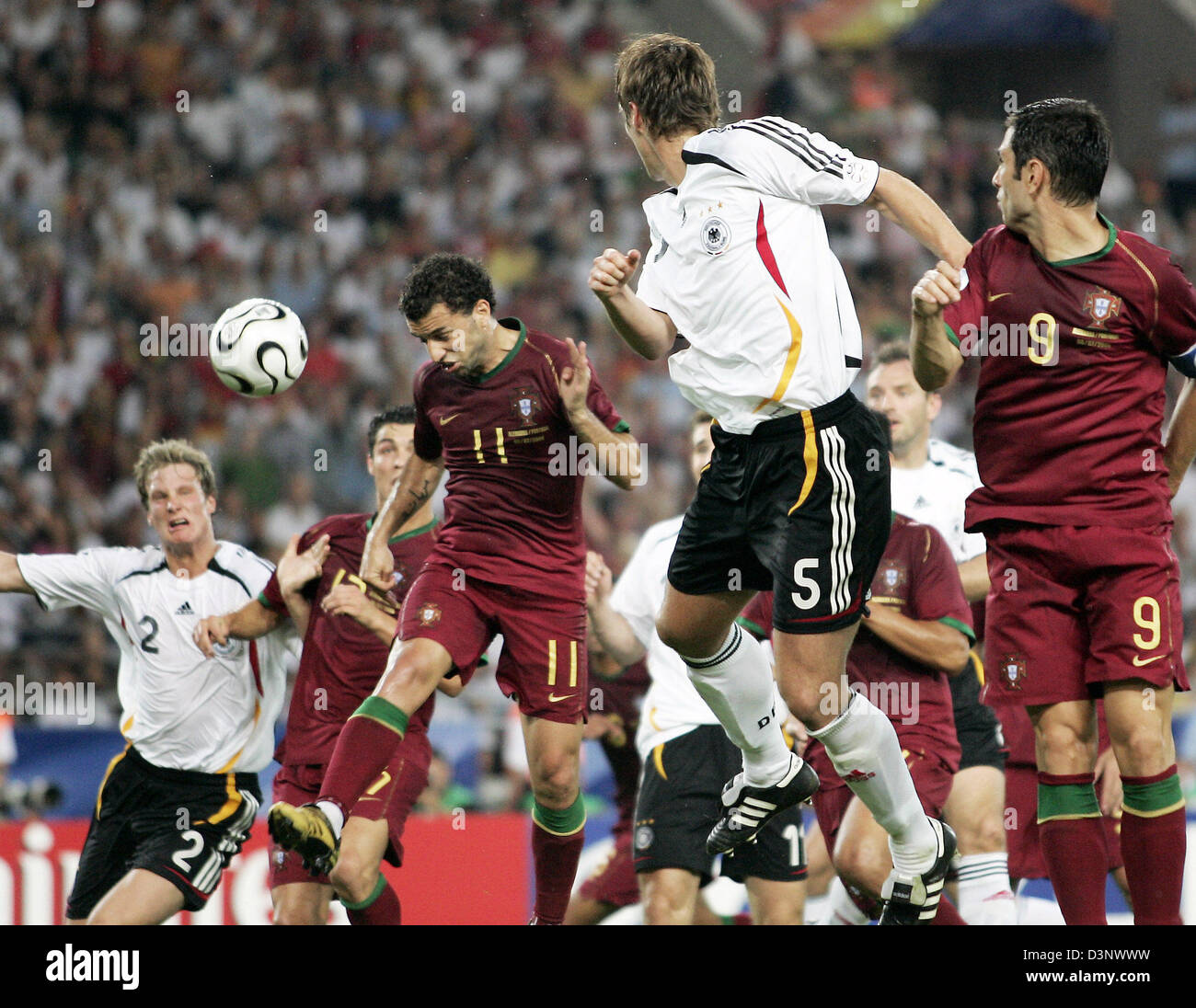 Sebastian Kehl (2-R) of Germany vies for the ball with Simao Sabrosa (2-L) of Portugal during the 3rd place match of the 2006 FIFA World Cup Germany vs. Portugal in Stuttgart, Germany, Saturday 08 July 2006. Pauleta of Portugal is seen on the right. Photo: RONALD WITTEK +++ Mobile Services OUT +++ Please refer to FIFA's terms and conditions Stock Photo