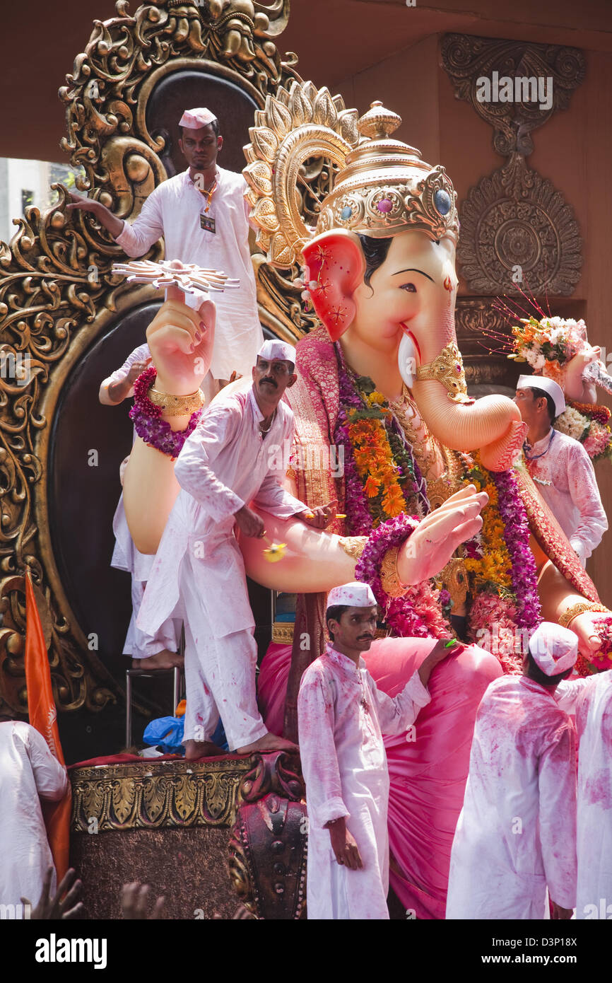 People at religious procession during Ganpati visarjan ceremony, Mumbai