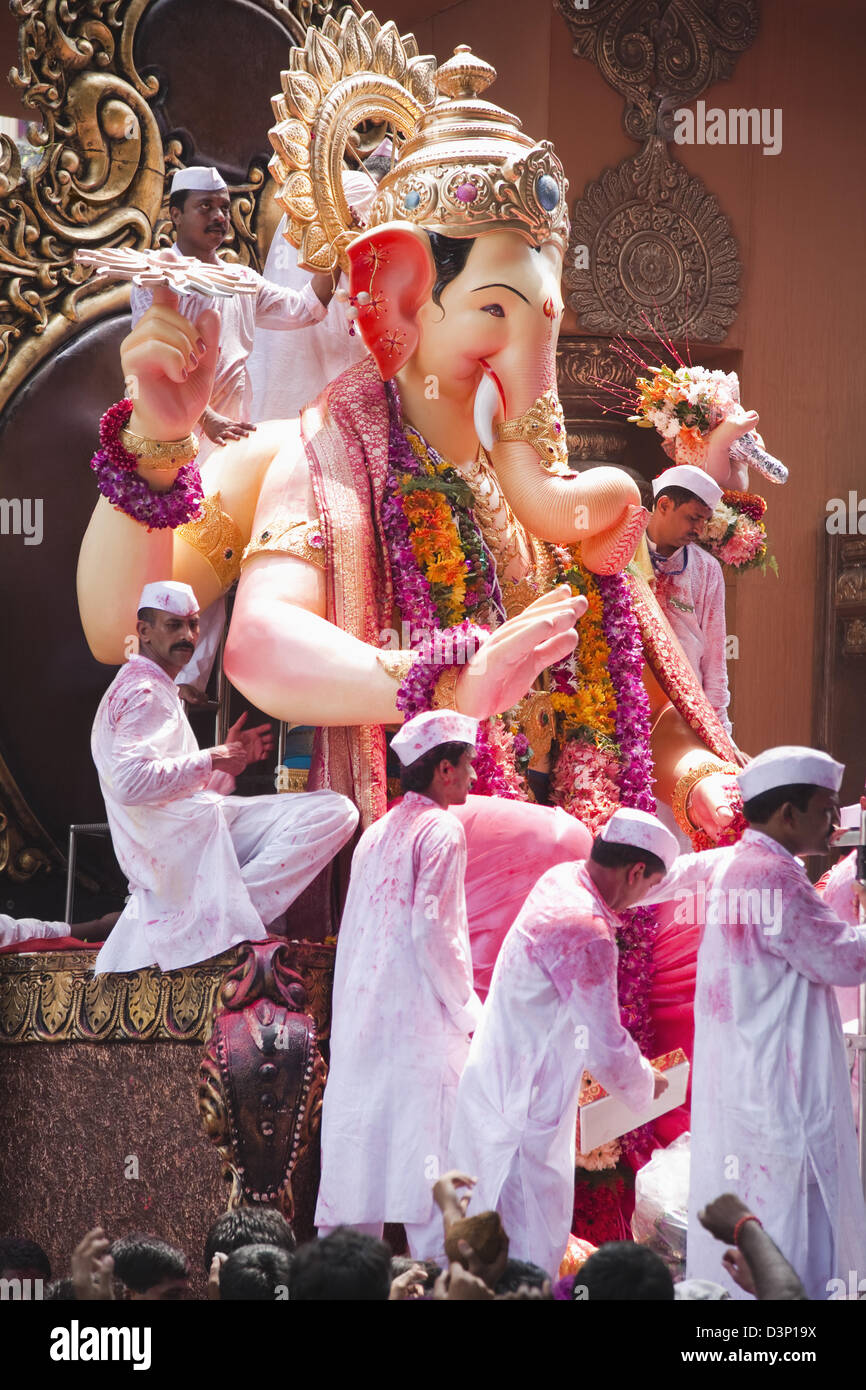 People at religious procession during Ganpati visarjan ceremony, Mumbai