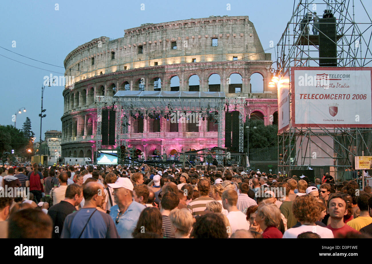 Visitors surge towards the stage in front of the Colosseum in Rome