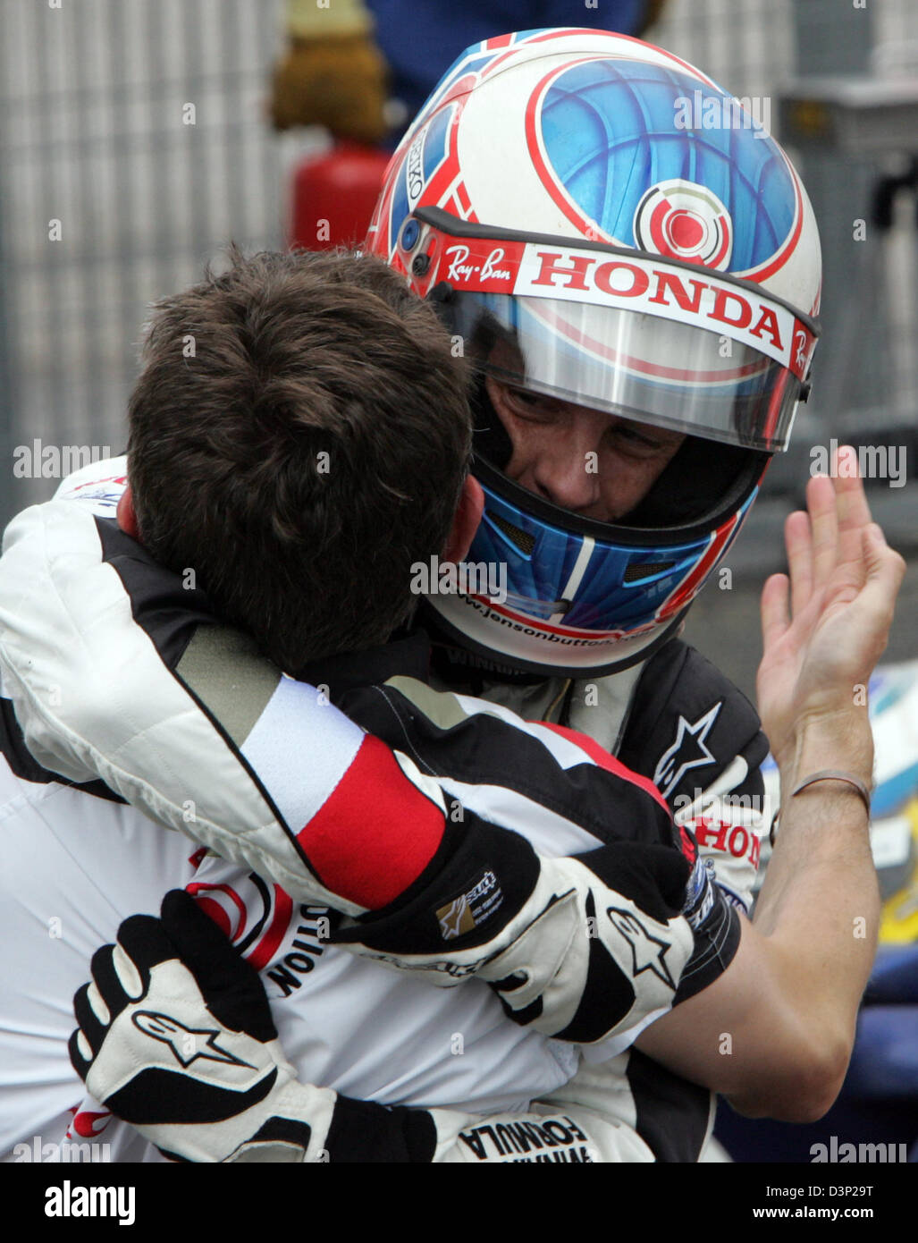 British Formula One driver Jenson Button of Honda F1 Team cheers after winning the Hungarian Grand Prix at the Hungaroring race track in Mogyorod near Budapest, Hungary, Sunday, 06 August 2006. Photo: Rainer Jensen Stock Photo