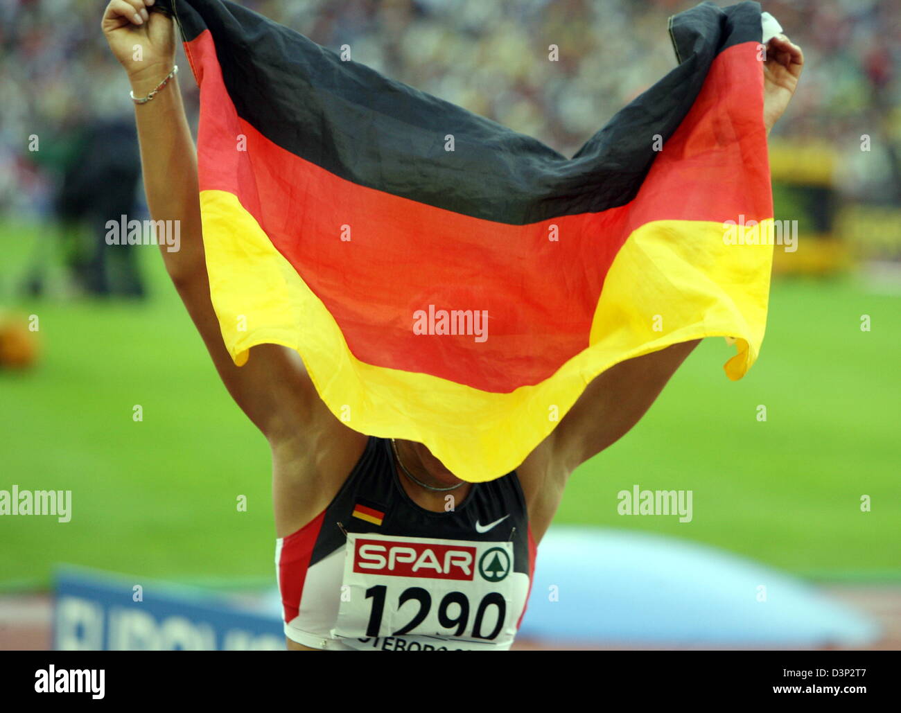 German athlete Kirsten Bolm cheers her third place in the 100m Hurdles final of the 19th European Athletics Championships in Gothenburg, Sweden, Friday, 11 August 2006. She was granted the silver medal after checking the photo finish. Photo: Kay Nietfeld Stock Photo