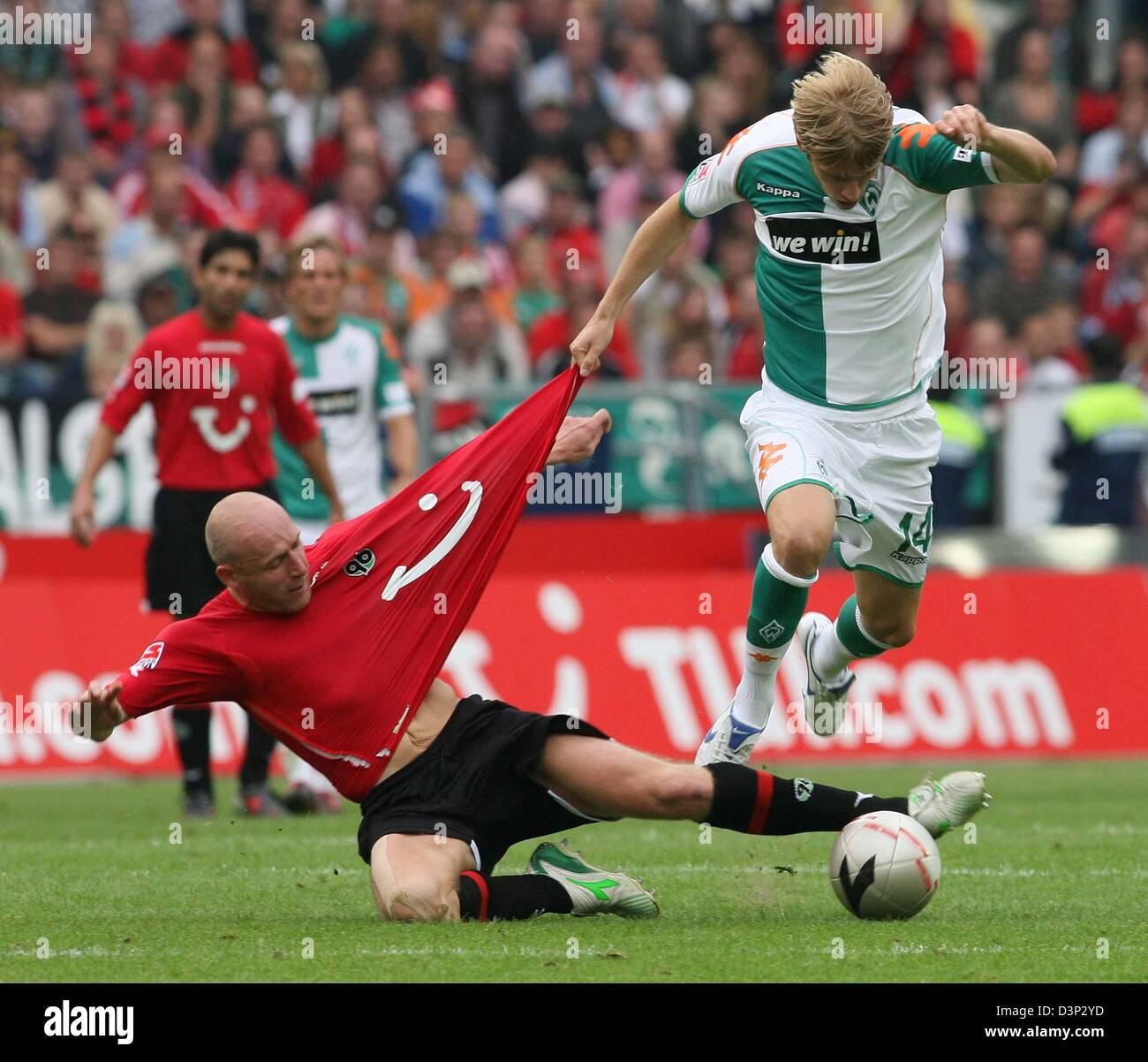 Jiri Stajner of Hannover 96 vies for the ball with Aaron Hunt (R) of Werder  Bremen during the Bundesliga match at AWD-Arena in Hanover, Germany, Sunday  13 August 2006. Werder Bremen won