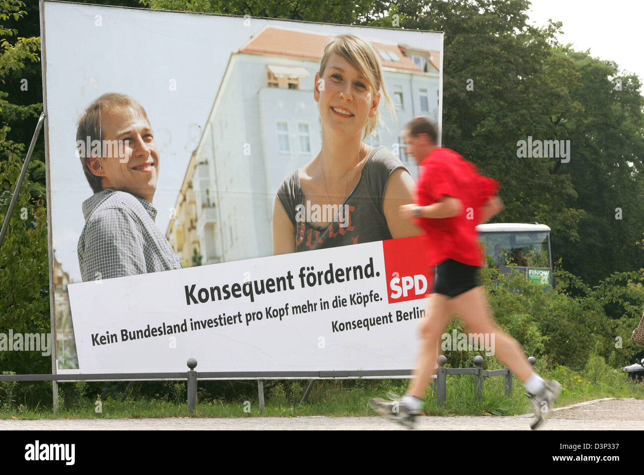 The picture shows an election poster of the Social Democratic Party (SPD) in Berlin, Germany, Wednesday 16 August 2006. Student Daniel Kind (L), displayed on the poster, is said to resemble former soccer national coach Juergen Klinsmann. The poster caused public debates, however, SPD regards the resemblance as a coincidence. Elections for the Berlin House of Representatives will be Stock Photo