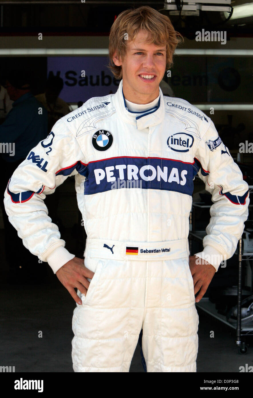 German Formula One test pilot Sebatian Vettel of BMW Sauber team poses for photographers in his team garage at Istanbul Park circuit near Istanbul, Turkey, Thursday, 24 August 2006. Photo: Rainer Jensen Stock Photo