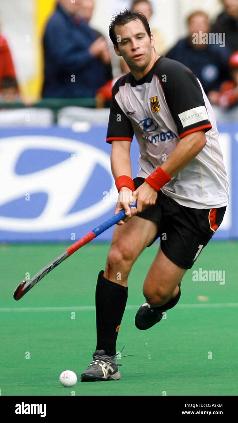 The photo shows the German international field hockey player Niklas